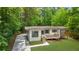 Charming exterior with a small deck and driveway at 1839 Belcher Pl, Austell, GA 30168
