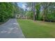 Charming home nestled in a lush green landscape with a well-manicured lawn at 1839 Belcher Pl, Austell, GA 30168