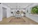 Bright kitchen features stainless steel appliances, center island, and ample natural light at 1839 Belcher Pl, Austell, GA 30168