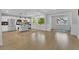 Inviting open concept floorplan showcasing the kitchen, island seating, and abundant natural light at 1839 Belcher Pl, Austell, GA 30168
