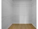 Walk-in closet with wire shelving and wood floor at 1839 Belcher Pl, Austell, GA 30168