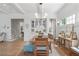 Open dining room showcasing hardwood floors, built-in hutch, with seating for Gathering and friends at 6575 Eli Davis Rd, Cumming, GA 30040