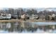 Scenic lake view featuring ducks floating on the water at 6575 Eli Davis Rd, Cumming, GA 30040