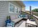 Comfortable outdoor patio area with a sectional sofa and stylish decor at 6575 Eli Davis Rd, Cumming, GA 30040