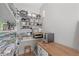 Organized pantry with wire shelving and wooden countertop for ample storage at 6575 Eli Davis Rd, Cumming, GA 30040