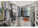 Walk-in closet with shelves and racks, offering ample storage space at 6575 Eli Davis Rd, Cumming, GA 30040