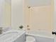 Clean bathroom with subway tile shower, marble countertop, and a modern sink at 686 Exchange Se St, Atlanta, GA 30315