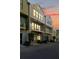 Three-story townhome with private balconies viewed during sunset at 686 Exchange Se St, Atlanta, GA 30315