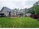 Large wooden deck with a screened-in porch, perfect for outdoor entertaining at 125 Murphy Creek Ln, Fayetteville, GA 30215