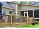 Expansive deck with views of the screened-in porch and lush backyard at 125 Murphy Creek Ln, Fayetteville, GA 30215
