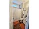 Hall bathroom features a shower and tub combination and linen closet at 125 Murphy Creek Ln, Fayetteville, GA 30215
