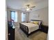 A lovely bedroom with a ceiling fan, natural light, and a soothing color scheme at 125 Murphy Creek Ln, Fayetteville, GA 30215