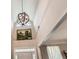 Bright foyer with a soaring ceiling, elegant light fixture, and neutral paint at 125 Murphy Creek Ln, Fayetteville, GA 30215