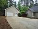 Detached two-car garage with a well-maintained driveway and convenient access at 125 Murphy Creek Ln, Fayetteville, GA 30215