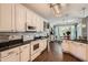 Bright kitchen featuring white cabinets, granite countertops, and stainless steel appliances at 125 Murphy Creek Ln, Fayetteville, GA 30215