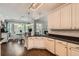 Well-designed kitchen with white cabinets, dark countertops, and an open layout to a breakfast nook at 125 Murphy Creek Ln, Fayetteville, GA 30215