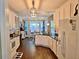 Charming kitchen with white cabinets, granite countertops, and a view of the breakfast nook at 125 Murphy Creek Ln, Fayetteville, GA 30215