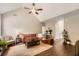 Spacious living room boasts a vaulted ceiling, fireplace, and hardwood floors, perfect for entertaining and relaxing at 125 Murphy Creek Ln, Fayetteville, GA 30215