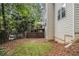 View of backyard featuring a fenced yard and upper deck with an umbrella table at 1495 Old Hunters Lake Dr, Marietta, GA 30062