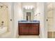 Cozy bathroom featuring a vanity and combination bath shower at 1495 Old Hunters Lake Dr, Marietta, GA 30062