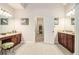 Bathroom features a double vanity with dark wood cabinets at 1495 Old Hunters Lake Dr, Marietta, GA 30062