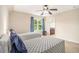 Charming bedroom has two twin beds and looks into an ensuite bathroom at 1495 Old Hunters Lake Dr, Marietta, GA 30062
