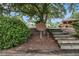 Neighborhood sign with greenery, steps and seating area at 1495 Old Hunters Lake Dr, Marietta, GA 30062
