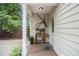 Cozy front porch with a charming welcome decor and neutral paint scheme at 1495 Old Hunters Lake Dr, Marietta, GA 30062