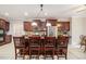 Open kitchen features a granite island with seating and stainless steel appliances at 1495 Old Hunters Lake Dr, Marietta, GA 30062