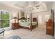 Spacious main bedroom features a trey ceiling and large windows at 1495 Old Hunters Lake Dr, Marietta, GA 30062
