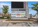 Shopping center sign with recognizable stores and cinema located on Merchants Walk at 1495 Old Hunters Lake Dr, Marietta, GA 30062