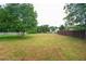 Large, fenced backyard offering privacy and plenty of space for outdoor activities and landscaping at 3230 Deer Valley Nw Dr, Acworth, GA 30101