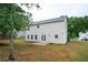 Exterior view of a two-story home with vinyl siding and spacious backyard at 3230 Deer Valley Nw Dr, Acworth, GA 30101