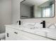 Bathroom featuring a white double vanity with a large mirror at 3230 Deer Valley Nw Dr, Acworth, GA 30101
