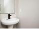Bathroom with modern fixtures and a pedestal sink at 3230 Deer Valley Nw Dr, Acworth, GA 30101
