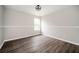 Spacious bedroom featuring luxury vinyl plank flooring and natural light at 3230 Deer Valley Nw Dr, Acworth, GA 30101