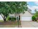 Charming two-story home featuring stone accents, a two-car garage, and a well-maintained landscaped front yard at 3230 Deer Valley Nw Dr, Acworth, GA 30101