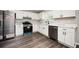 Newly renovated kitchen with white cabinets, granite countertops and stainless steel appliances at 3230 Deer Valley Nw Dr, Acworth, GA 30101