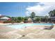 Large community pool with lounge chairs and umbrellas, perfect for outdoor recreation and relaxation at 6851 Roswell Rd # H12, Atlanta, GA 30328