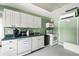 This kitchen offers practical appliances, ample cabinet storage, and a functional layout at 6851 Roswell Rd # H12, Atlanta, GA 30328