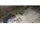 Dilapidated interior reveals damaged flooring and exposed beams requiring extensive restoration at 868 Oakhill Sw Ave, Atlanta, GA 30310
