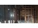Interior view showing exposed framing, duct work, and missing drywall at 868 Oakhill Sw Ave, Atlanta, GA 30310