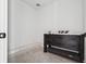 Bathroom vanity with dark wood cabinets and neutral countertop at 1145 Kingston Drive, Atlanta, GA 30342