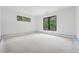 Unfinished bedroom with two windows providing natural light, awaiting personalization and finishing touches at 1145 Kingston Drive, Atlanta, GA 30342