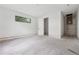 Bedroom with a window and an open doorway at 1145 Kingston Drive, Atlanta, GA 30342