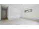 Unfinished bedroom with a black frame window providing natural light, awaiting personalization and finishing touches at 1145 Kingston Drive, Atlanta, GA 30342