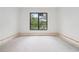 Bright bedroom with a large window offering natural light and views of the outdoors at 1145 Kingston Drive, Atlanta, GA 30342