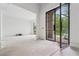 A view of the foyer with a black-trimmed glass door leading to the outside at 1145 Kingston Drive, Atlanta, GA 30342