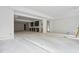 Open living room with modern details and large windows allowing for natural light at 1145 Kingston Drive, Atlanta, GA 30342