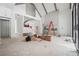 Spacious living room with exposed wooden beams, fireplace, and a staircase at 1145 Kingston Drive, Atlanta, GA 30342
